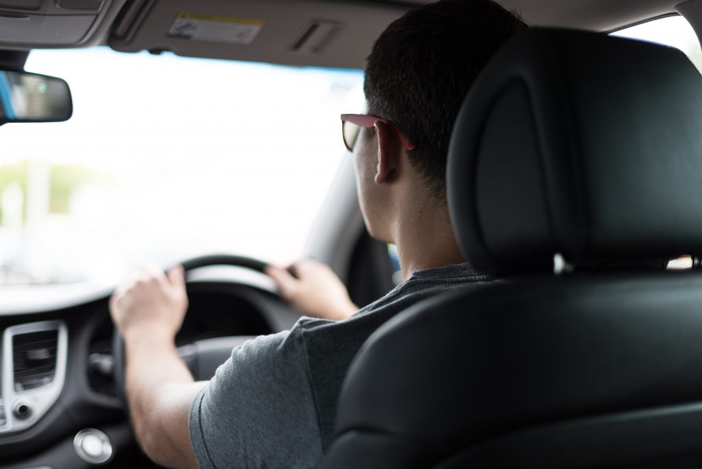 Young driver looking at the road ahead