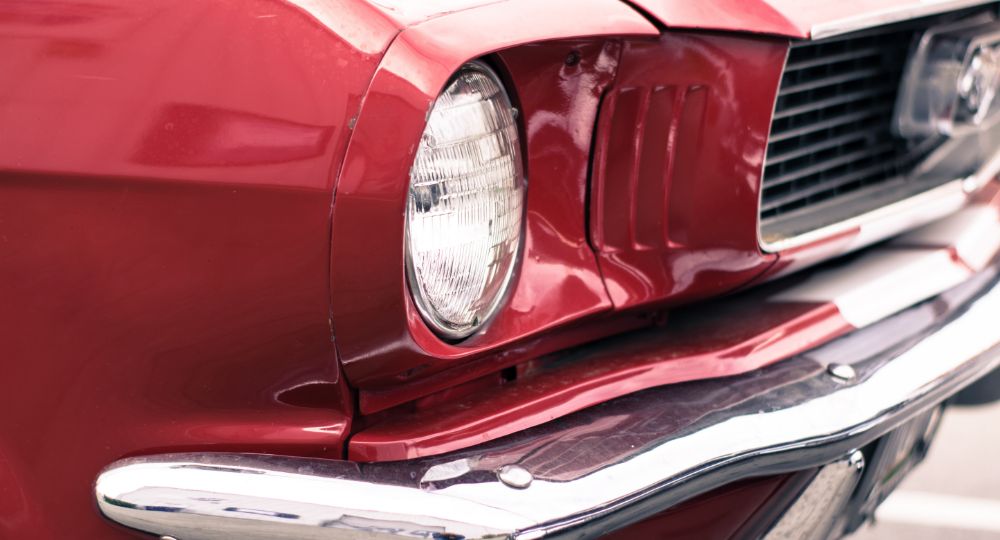 Close-up shot of red classic American car