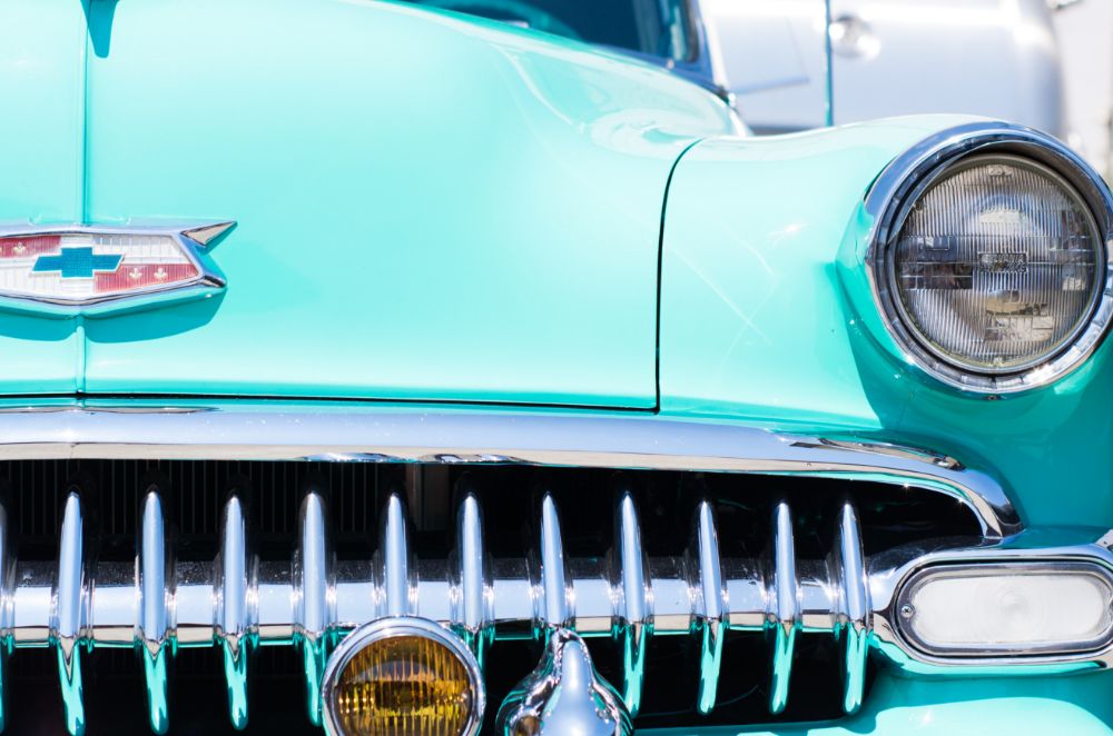 Close-up shot of a blue classic American car