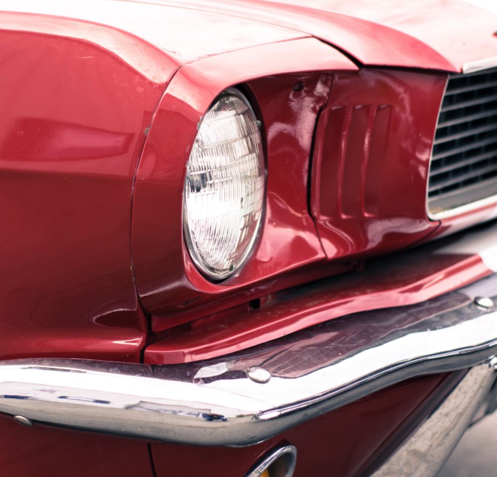 Close-up shot of red classic American car