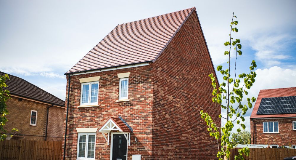 Exterior shot of house with other houses around