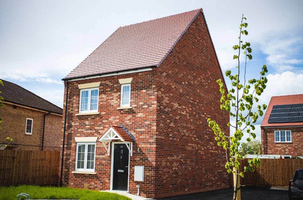 Exterior shot of house with other houses around