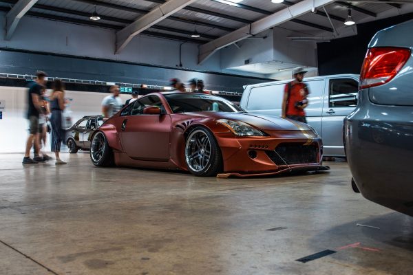 A modified car parked up in a car park