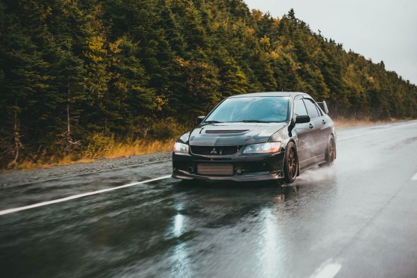 Mitsubishi Lancer Evolution on wet road