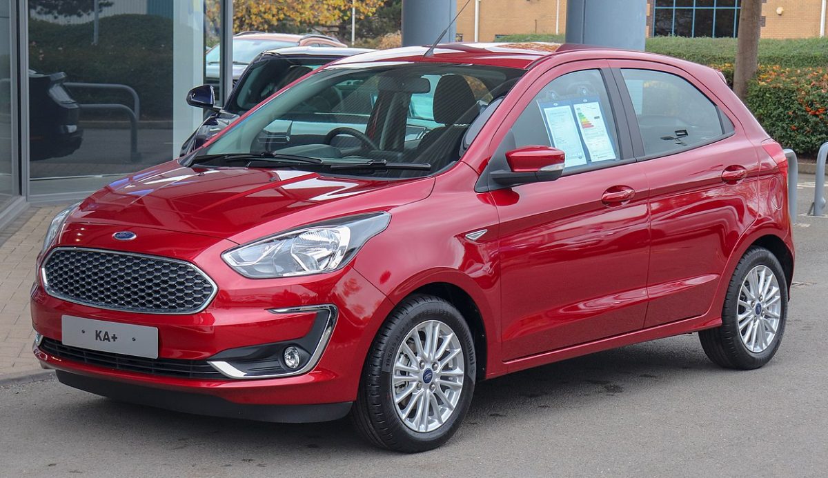 Red Ford KA parked outside